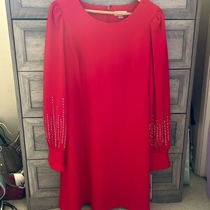 Elegant Red Dress with Embellished Sleeves